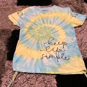 It say love is good Tie-dyed T-shirt size large Waze ruffles on the side